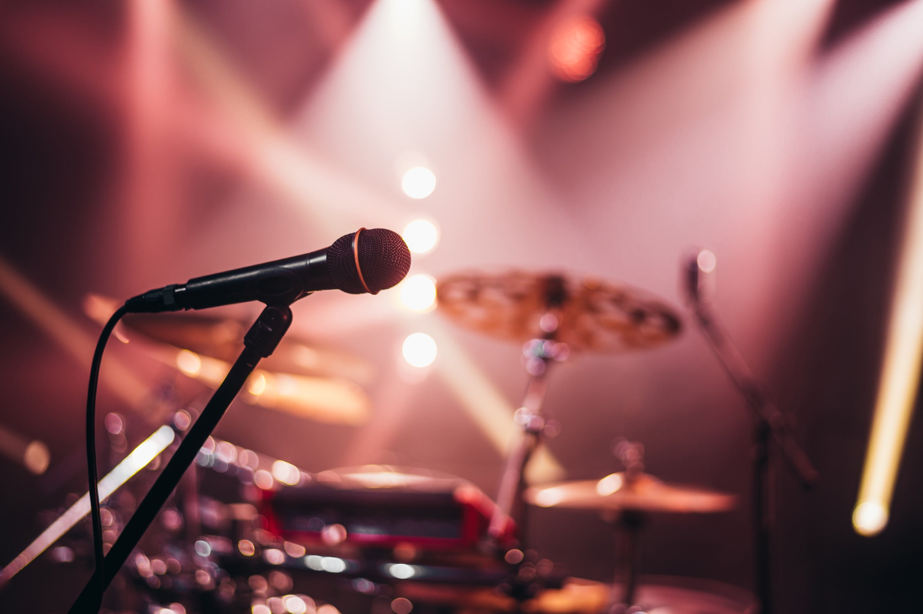 Rental Gear like microphone, stands and drums with cymbals